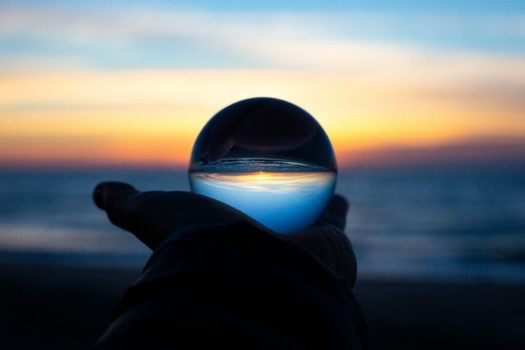 Man looking at crystal ball